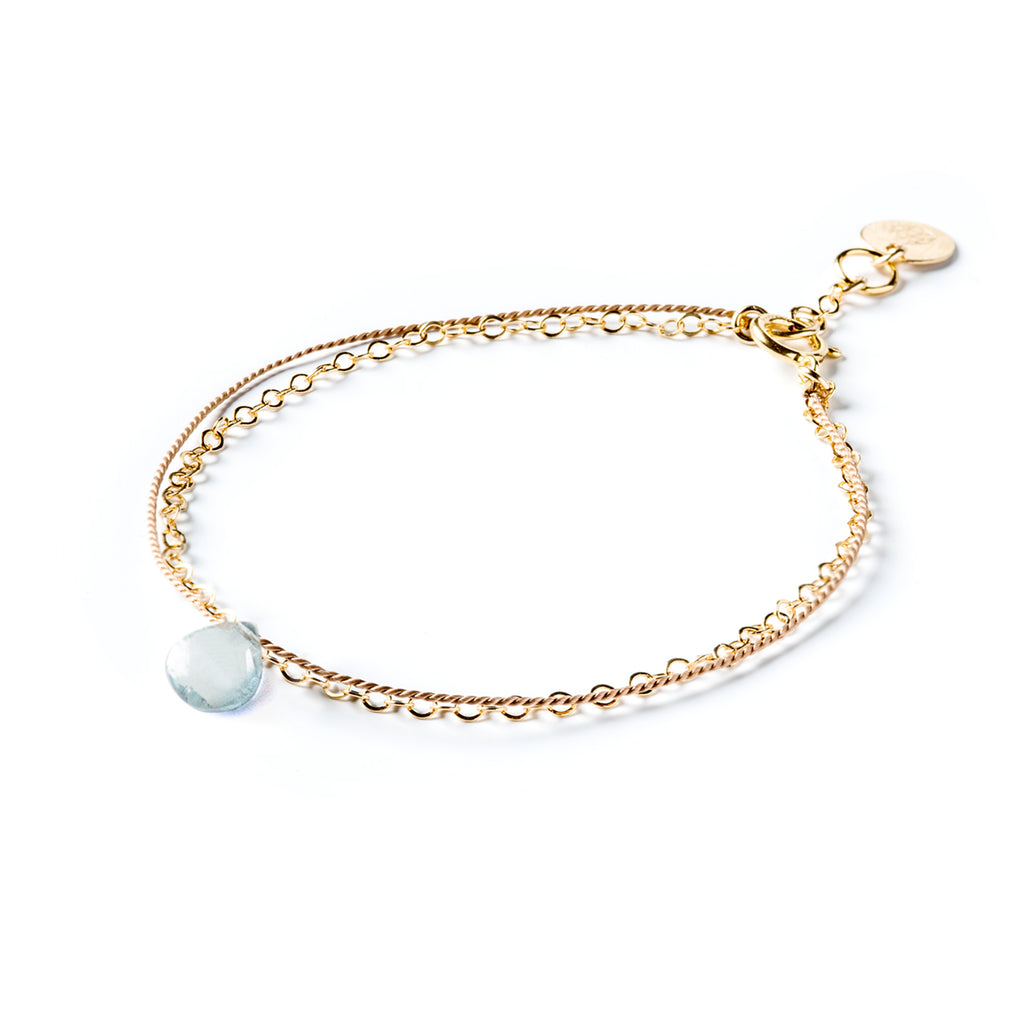 Wanderlust Life Ethically Handmade jewellery made in the UK. Minimalist gold and fine cord jewellery. march birthstone, gold & silk aquamarine bracelet