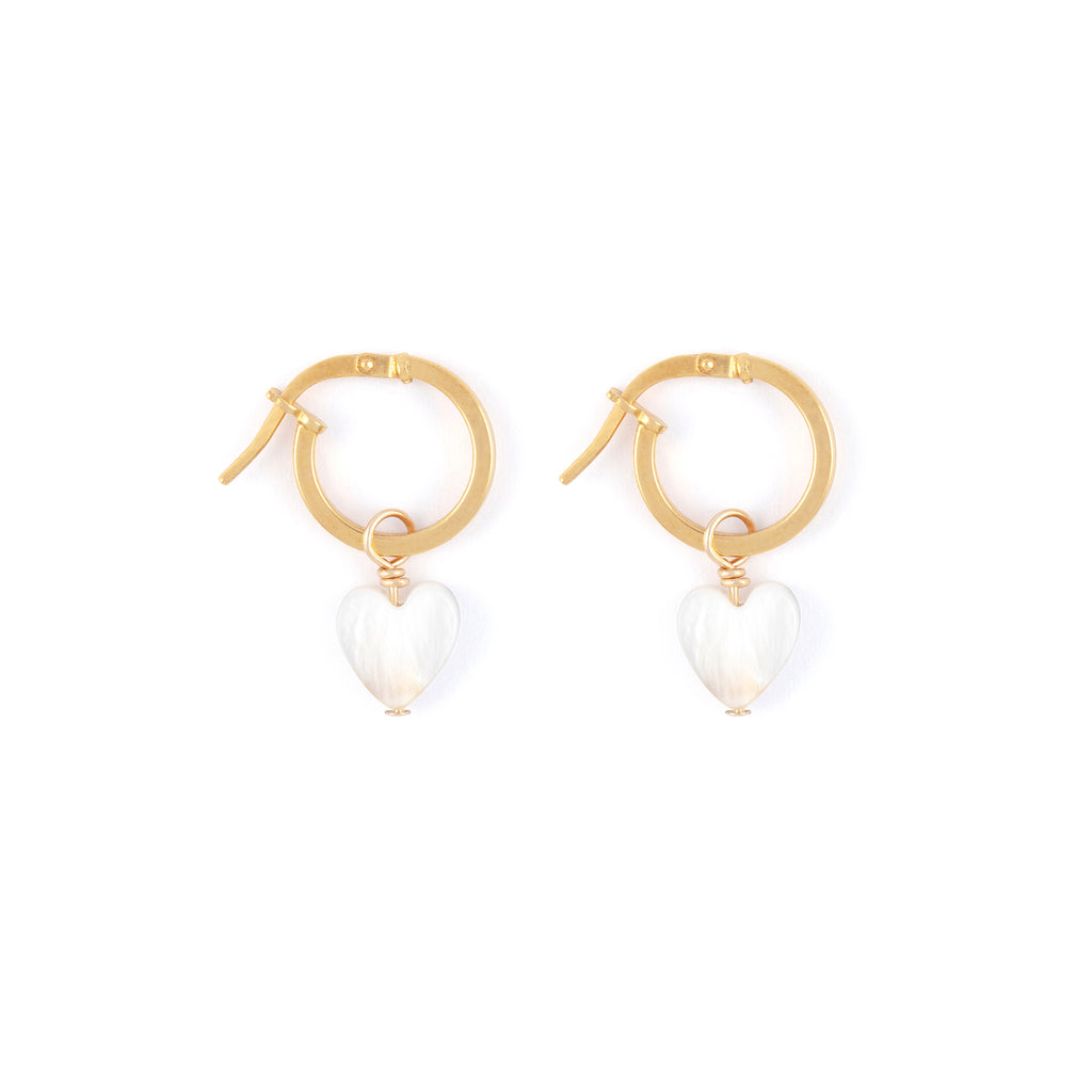 Mother of pearl heart charms dangle from 14k gold vermeil hoops.